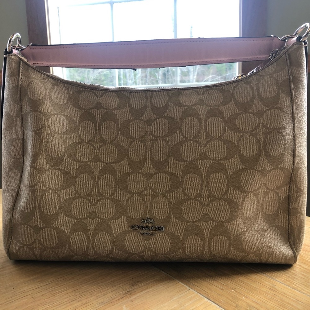 Tan and pink coach purse